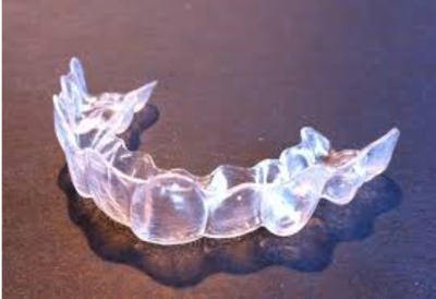 This is the image for the news article titled How to Clean Your Invisalign Aligners